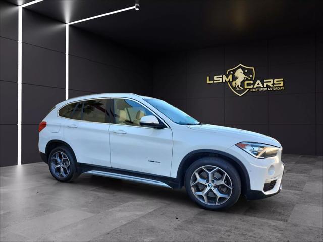 used 2018 BMW X1 car, priced at $9,999
