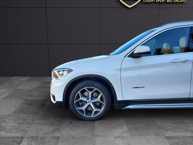 used 2018 BMW X1 car, priced at $9,999