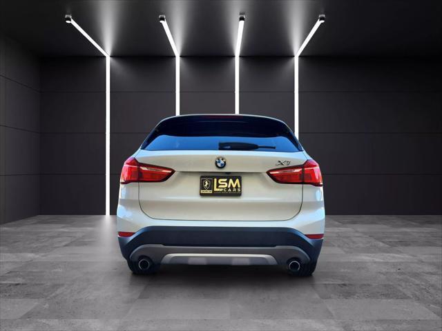 used 2018 BMW X1 car, priced at $9,999