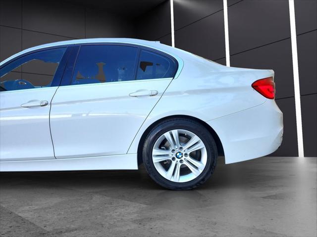 used 2018 BMW 330 car, priced at $12,899