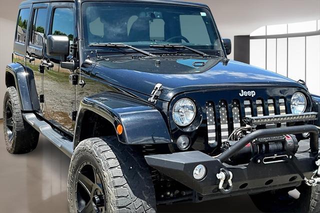 used 2015 Jeep Wrangler Unlimited car, priced at $21,699