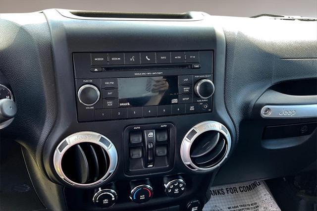 used 2015 Jeep Wrangler Unlimited car, priced at $21,699