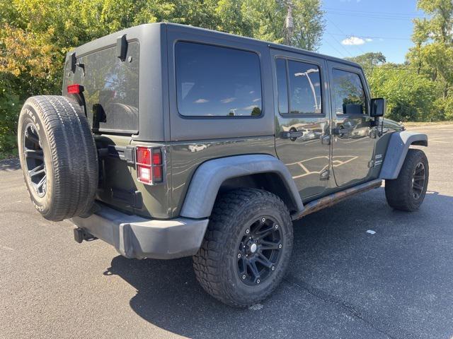 used 2015 Jeep Wrangler Unlimited car, priced at $16,778