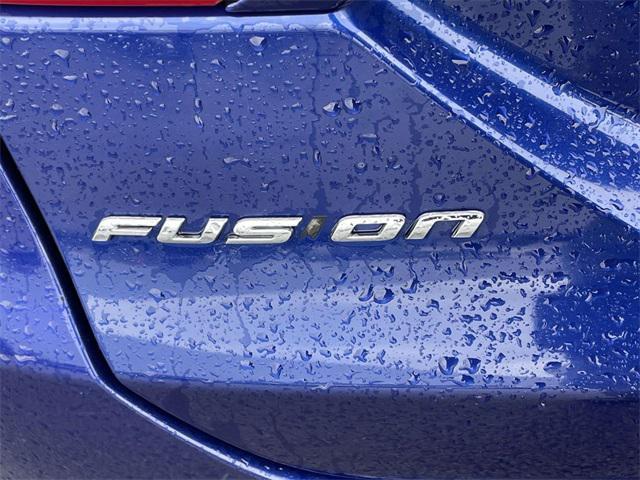 used 2014 Ford Fusion car, priced at $7,750