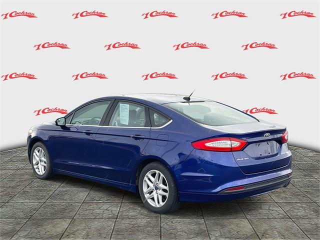 used 2014 Ford Fusion car, priced at $7,750