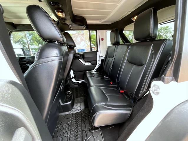 used 2016 Jeep Wrangler Unlimited car, priced at $26,309