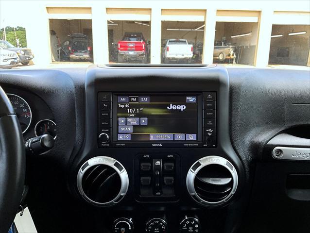 used 2016 Jeep Wrangler Unlimited car, priced at $26,309