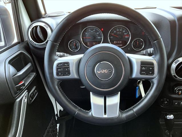 used 2016 Jeep Wrangler Unlimited car, priced at $26,309