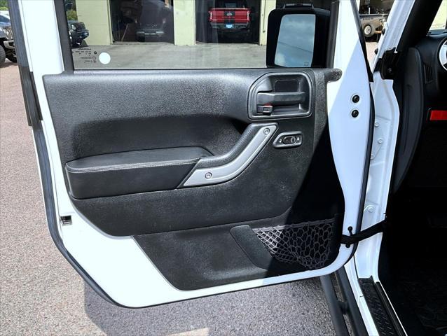 used 2016 Jeep Wrangler Unlimited car, priced at $26,309