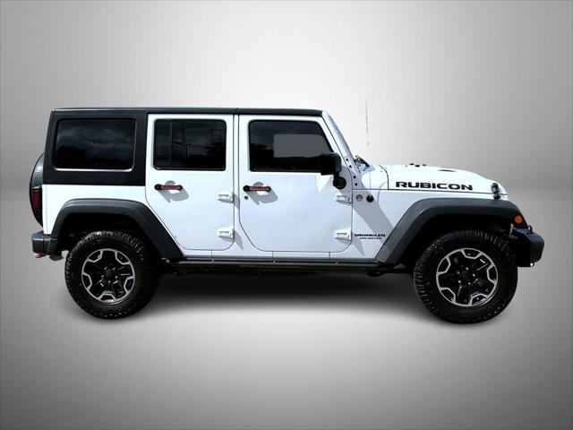 used 2016 Jeep Wrangler Unlimited car, priced at $26,309