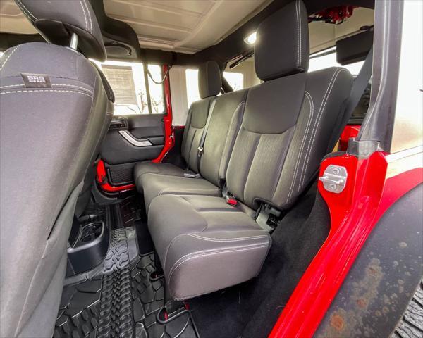 used 2014 Jeep Wrangler Unlimited car, priced at $22,899