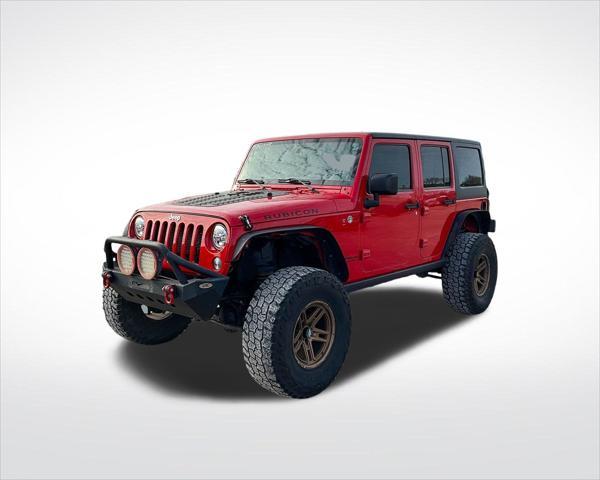 used 2014 Jeep Wrangler Unlimited car, priced at $22,899