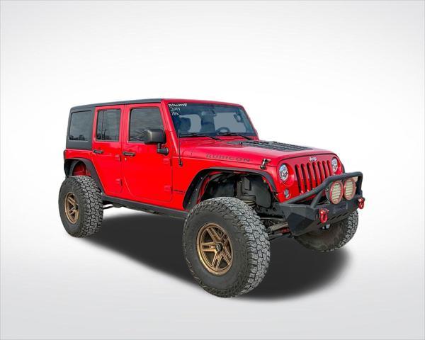 used 2014 Jeep Wrangler Unlimited car, priced at $22,899