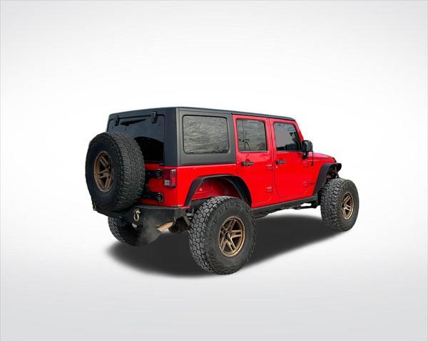 used 2014 Jeep Wrangler Unlimited car, priced at $22,899