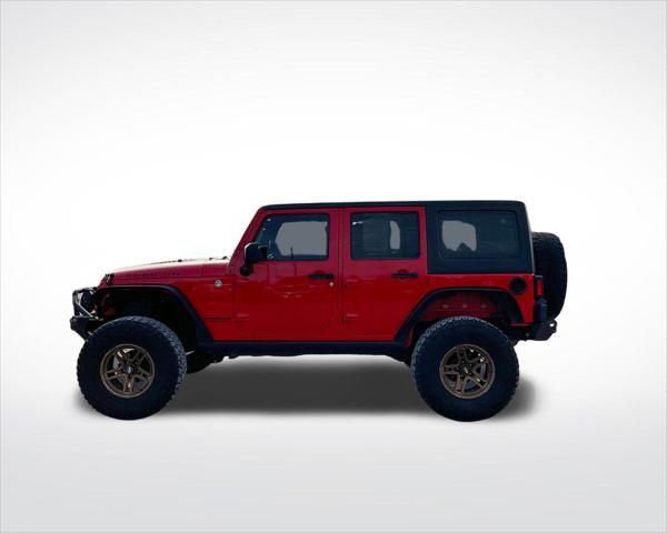 used 2014 Jeep Wrangler Unlimited car, priced at $22,899