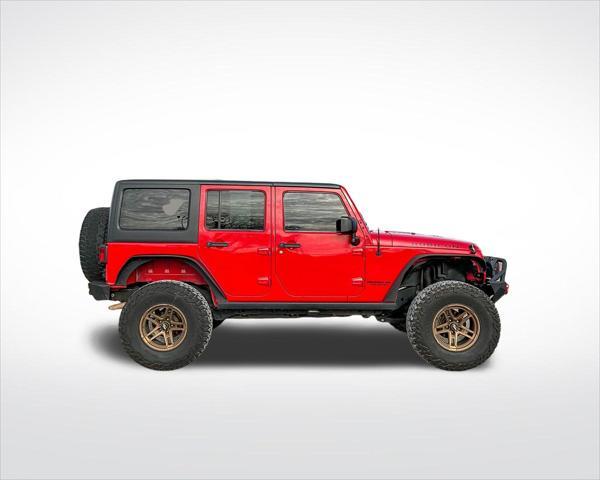 used 2014 Jeep Wrangler Unlimited car, priced at $22,899