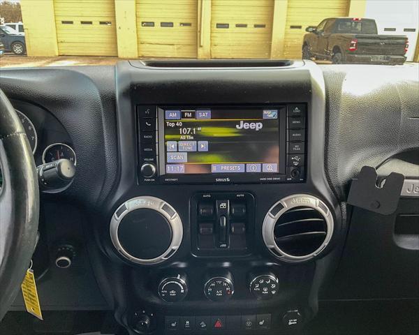 used 2014 Jeep Wrangler Unlimited car, priced at $22,899