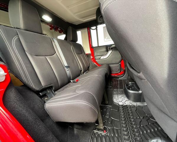 used 2014 Jeep Wrangler Unlimited car, priced at $22,899