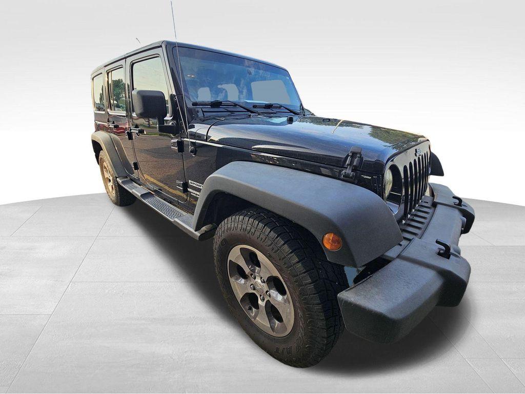 used 2012 Jeep Wrangler Unlimited car, priced at $16,757