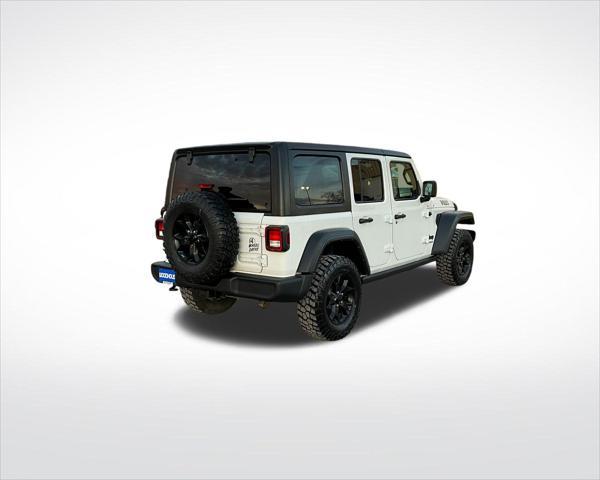 used 2021 Jeep Wrangler Unlimited car, priced at $33,042