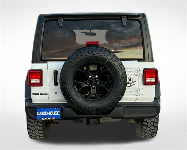 used 2021 Jeep Wrangler Unlimited car, priced at $32,636