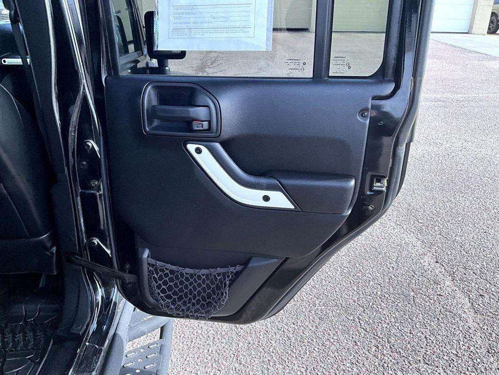 used 2015 Jeep Wrangler Unlimited car, priced at $17,335