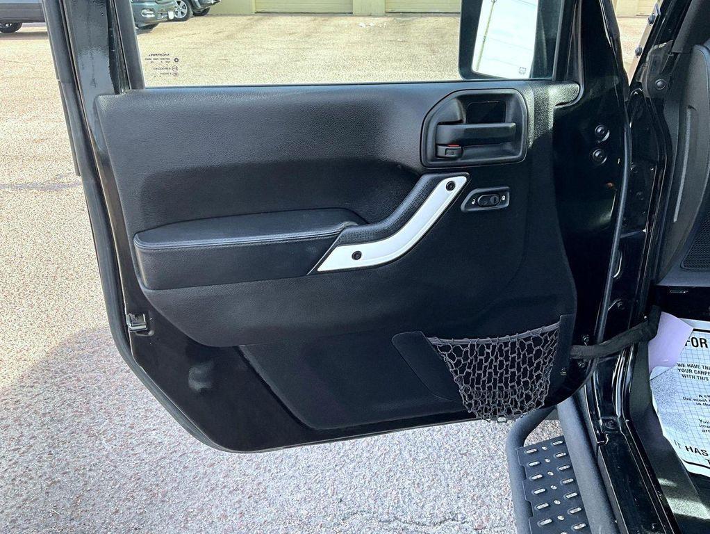 used 2015 Jeep Wrangler Unlimited car, priced at $17,335