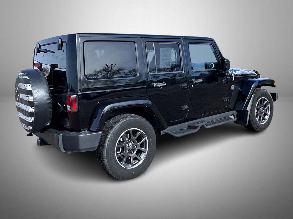 used 2015 Jeep Wrangler Unlimited car, priced at $17,335