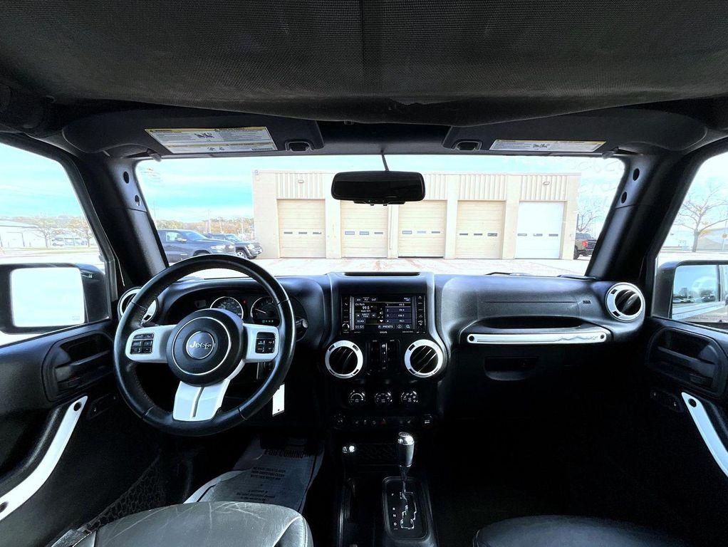 used 2015 Jeep Wrangler Unlimited car, priced at $17,335