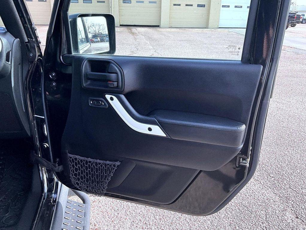 used 2015 Jeep Wrangler Unlimited car, priced at $17,335