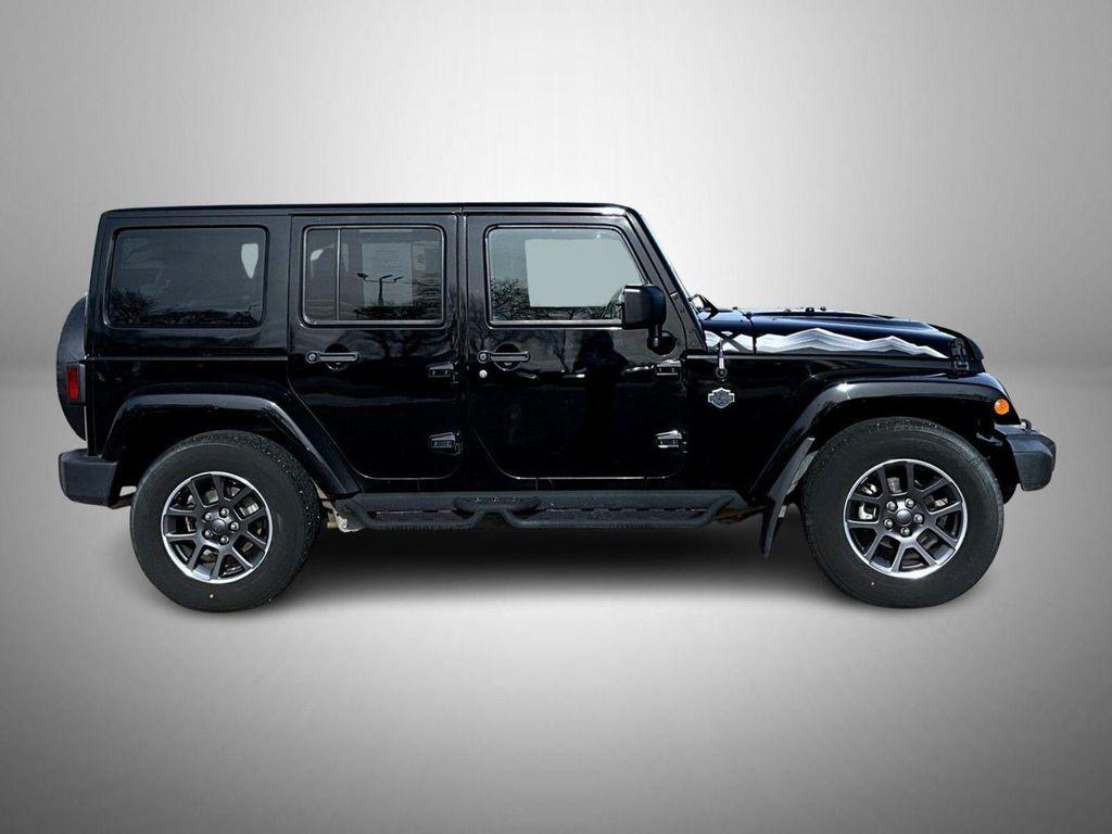 used 2015 Jeep Wrangler Unlimited car, priced at $17,335