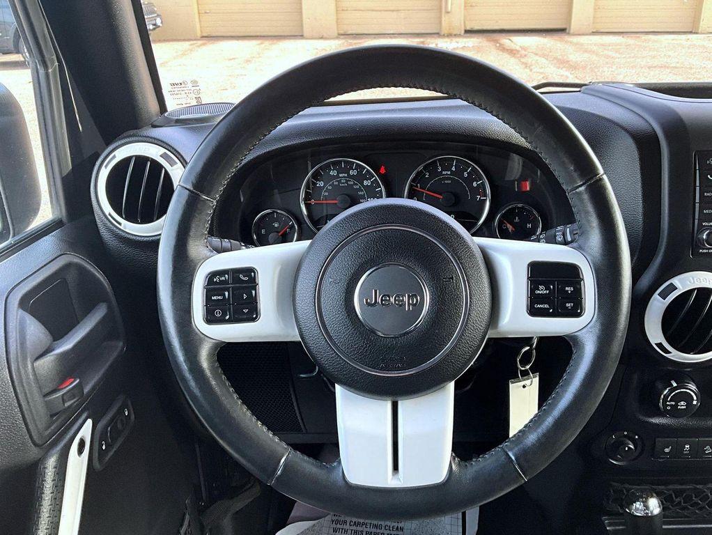 used 2015 Jeep Wrangler Unlimited car, priced at $17,335