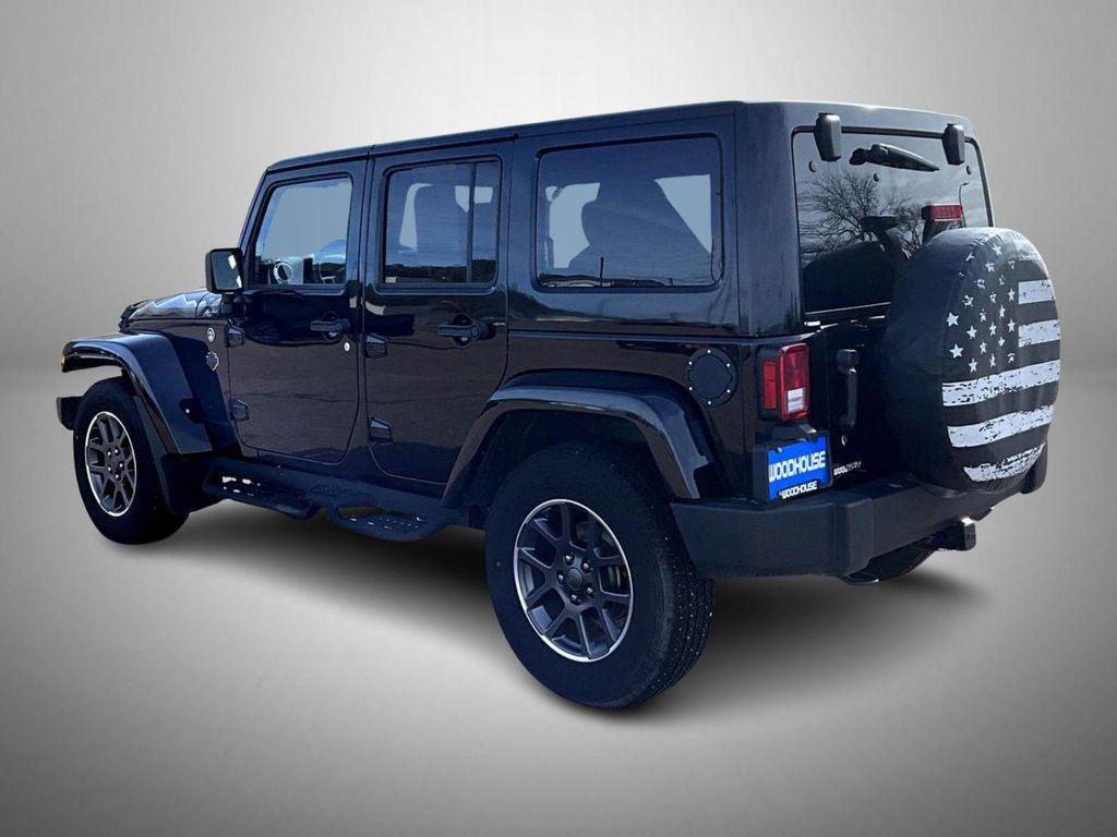 used 2015 Jeep Wrangler Unlimited car, priced at $17,335