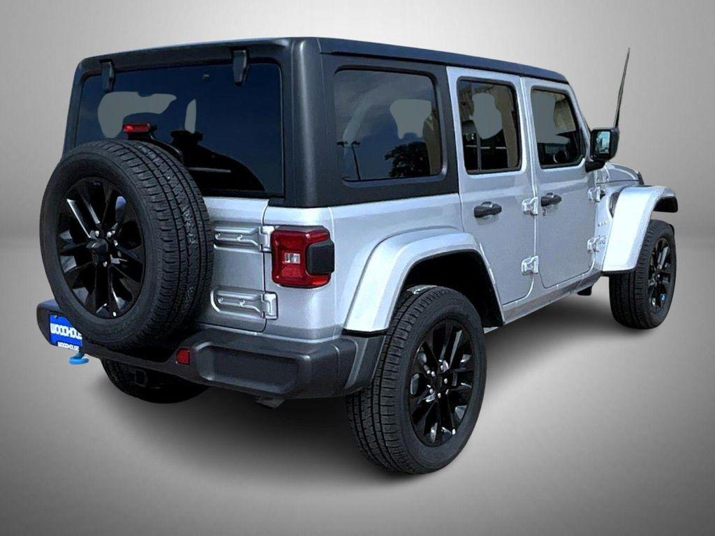 used 2023 Jeep Wrangler 4xe car, priced at $32,856