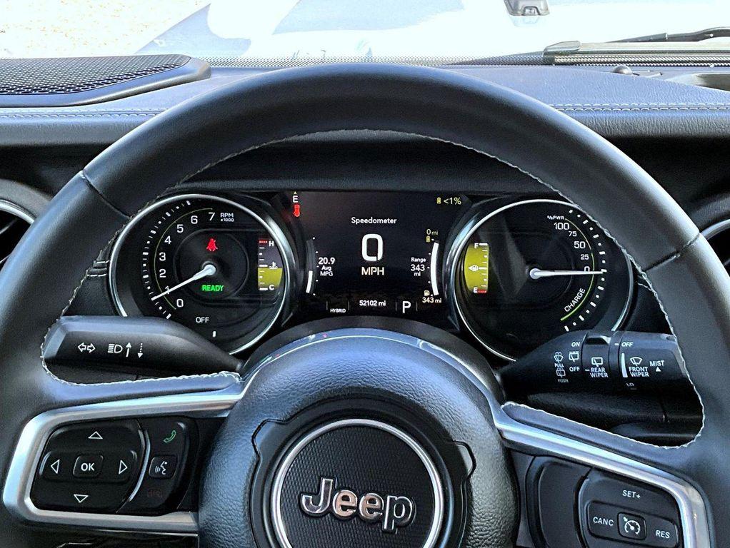 used 2023 Jeep Wrangler 4xe car, priced at $32,856