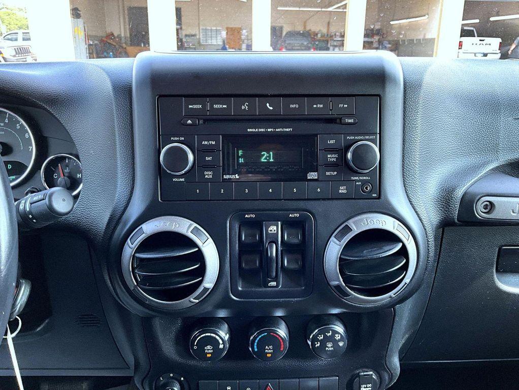used 2015 Jeep Wrangler Unlimited car, priced at $18,850