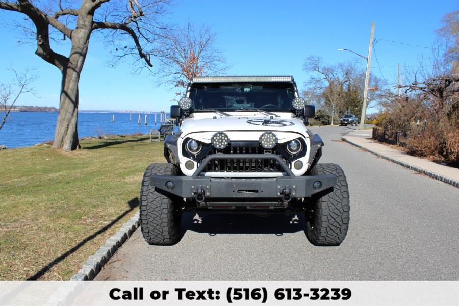 used 2015 Jeep Wrangler Unlimited car, priced at $26,329