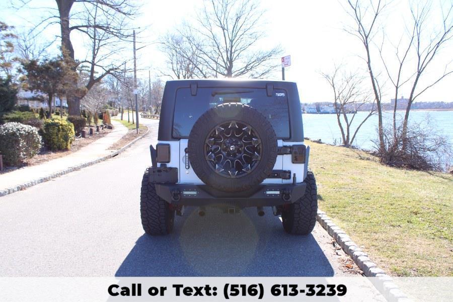 used 2015 Jeep Wrangler Unlimited car, priced at $26,329