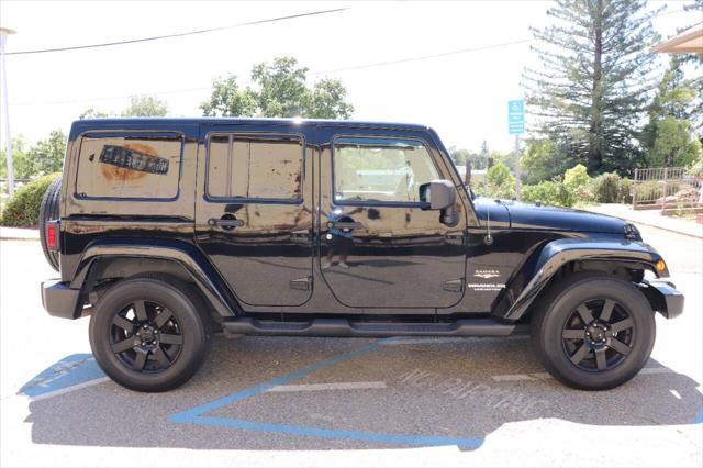 used 2013 Jeep Wrangler Unlimited car, priced at $16,895