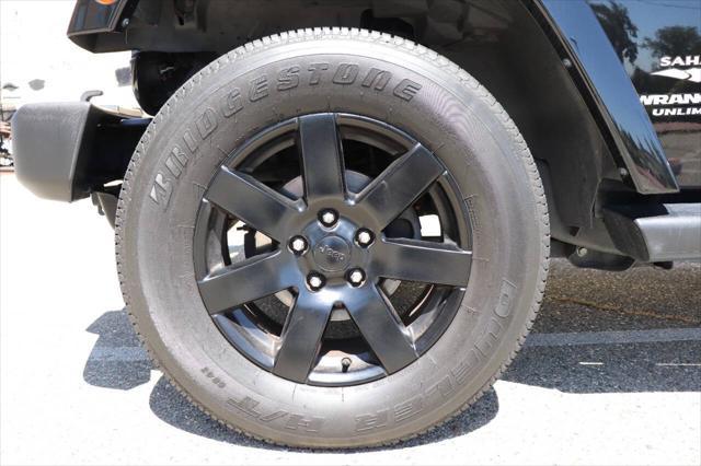 used 2013 Jeep Wrangler Unlimited car, priced at $16,895