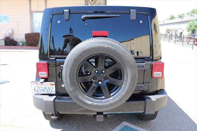 used 2013 Jeep Wrangler Unlimited car, priced at $16,895