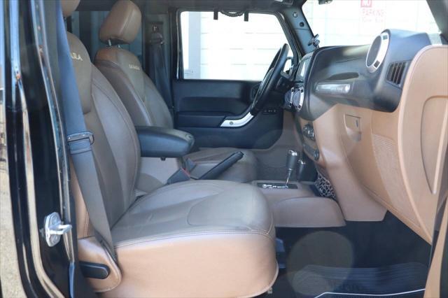 used 2013 Jeep Wrangler Unlimited car, priced at $16,895