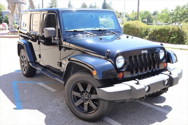 used 2013 Jeep Wrangler Unlimited car, priced at $16,895