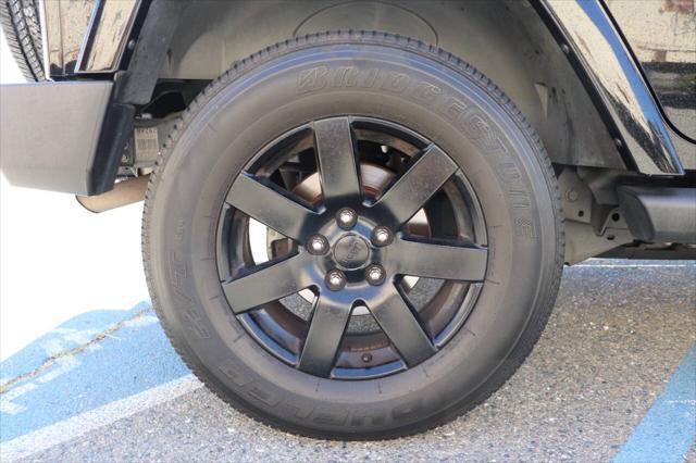 used 2013 Jeep Wrangler Unlimited car, priced at $16,895