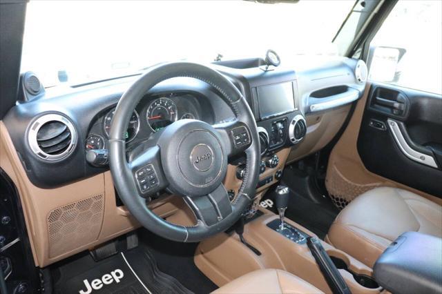 used 2013 Jeep Wrangler Unlimited car, priced at $16,895