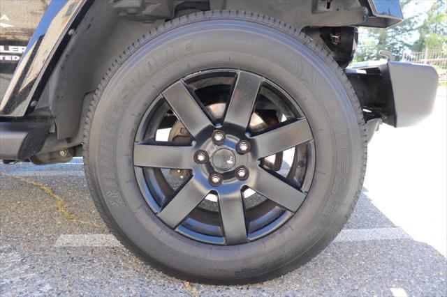 used 2013 Jeep Wrangler Unlimited car, priced at $16,895