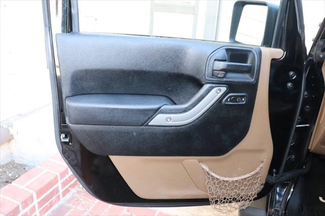 used 2013 Jeep Wrangler Unlimited car, priced at $16,895