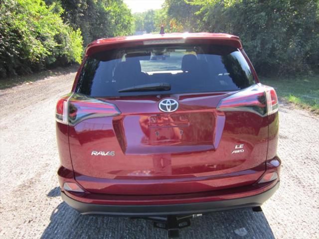 used 2018 Toyota RAV4 car, priced at $19,988