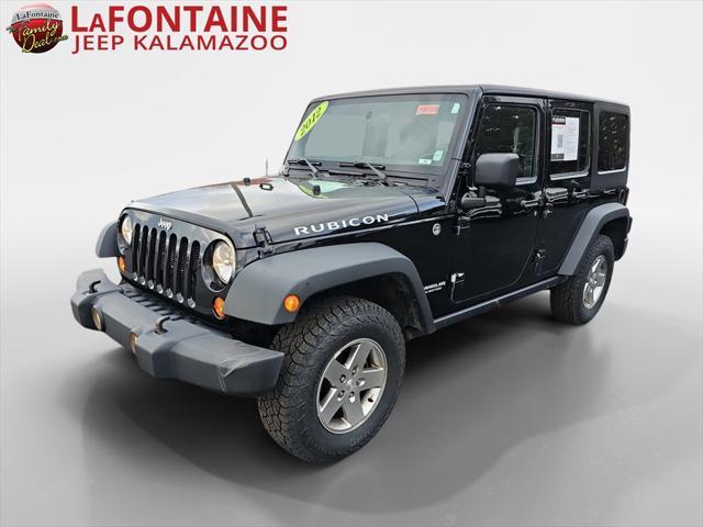 used 2012 Jeep Wrangler Unlimited car, priced at $11,956