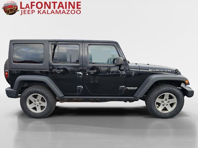 used 2012 Jeep Wrangler Unlimited car, priced at $11,956